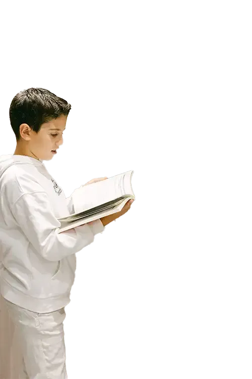 girl in a hat stands and smiles